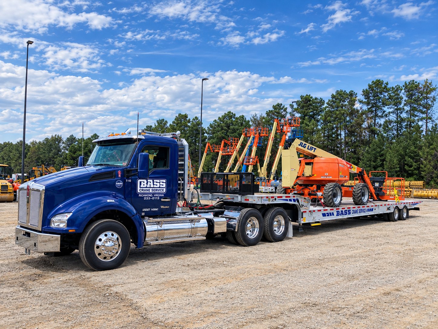 Bass Crane lowboy loaded with a telehandler and lift equipment