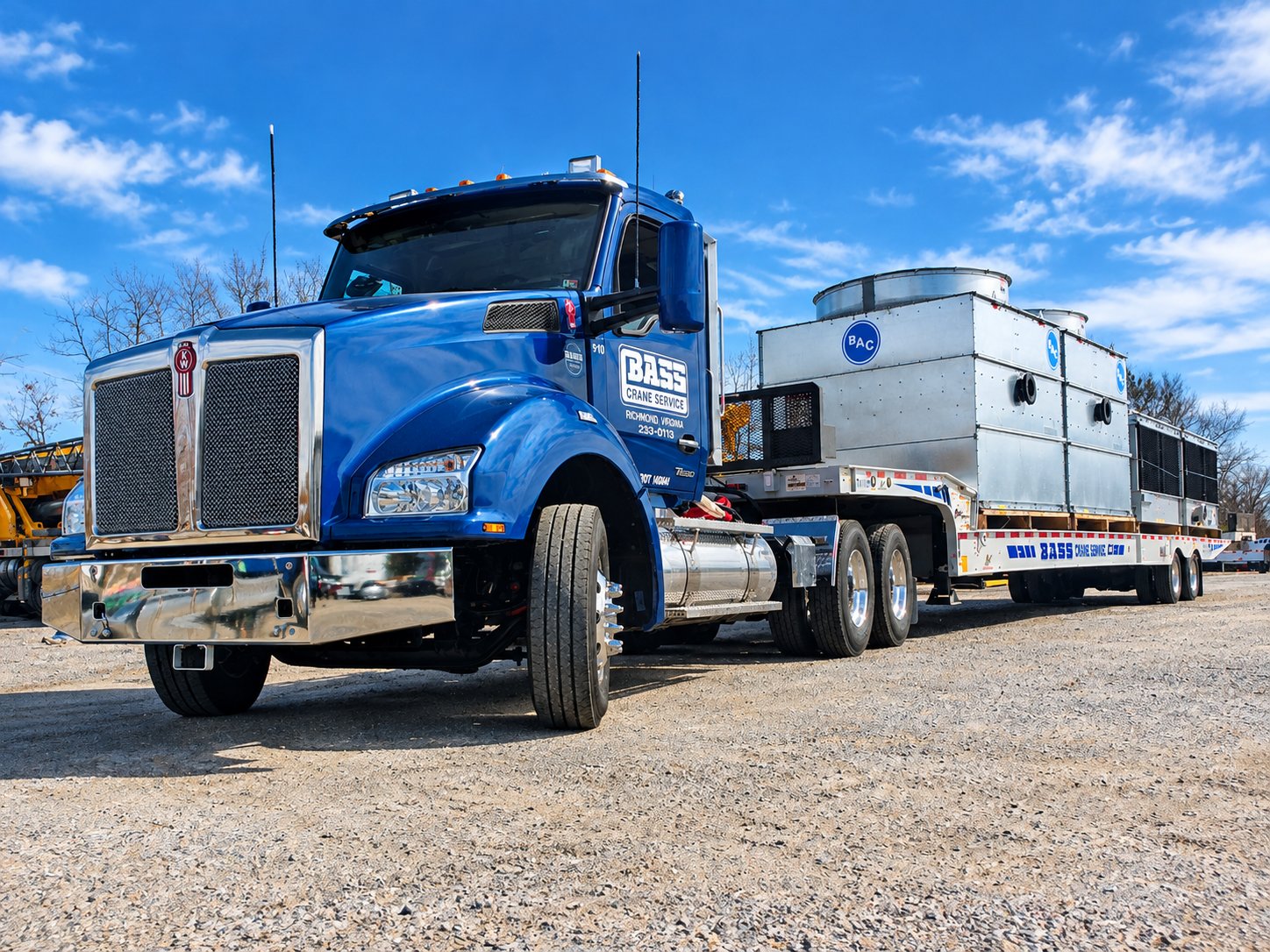 Bass Crane Kenworth truck delivering a cooling tower unit